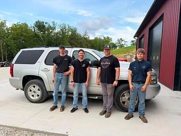 Gearhead Vets members wrenching on a project in the workshop
