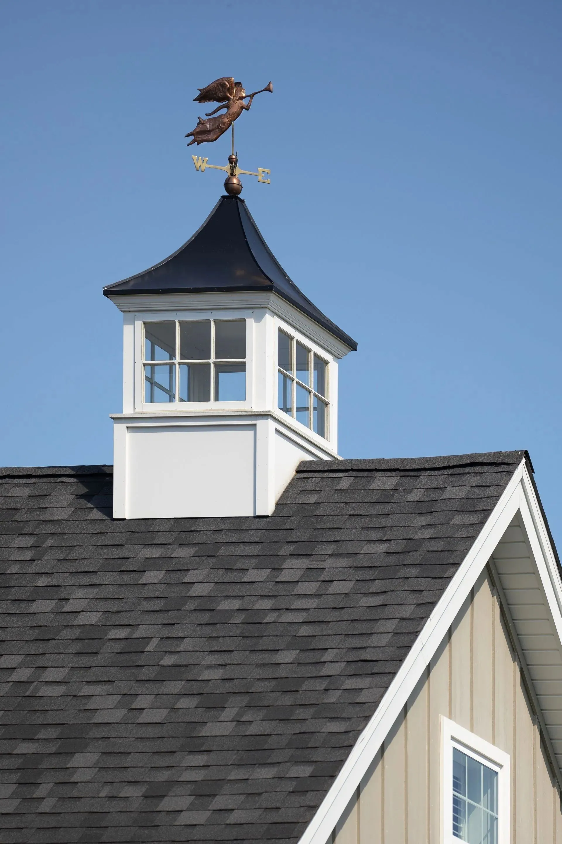 Cupola with arched vents and a copper roof