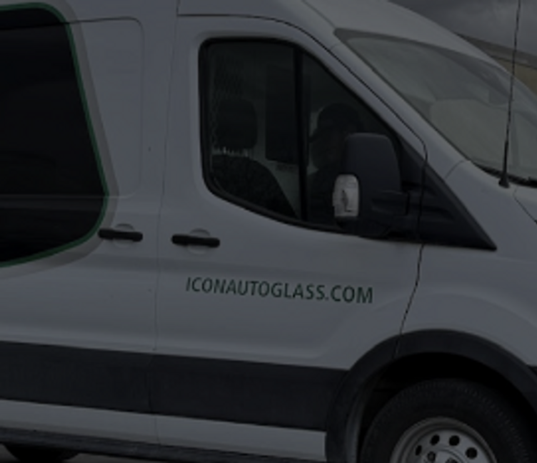 Icon Auto Glass mobile service vans parked outside the shop