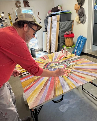 Rick Diamond painting in his workshop