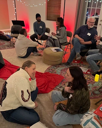 A Story Healing workshop group gathered in conversation