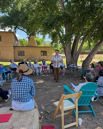 A Story Healing retreat group gathered outdoors