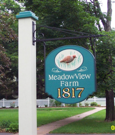 Hand carved MeadowView Farm sign with gold leaf year by New England Sign Carvers