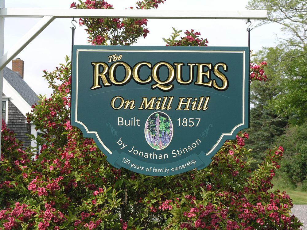Hand carved wooden The Rocques sign by New England Sign Carvers