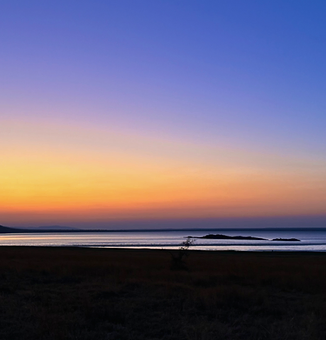 Sunset over the water at Melorane