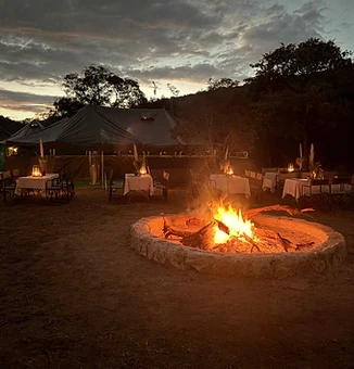 The firepit ablaze before dinner in the boma