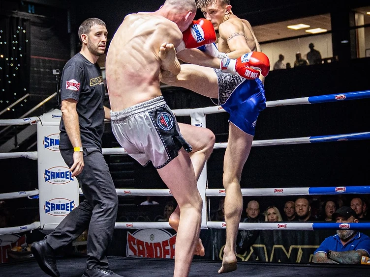 Muay Thai roundhouse kick in competition