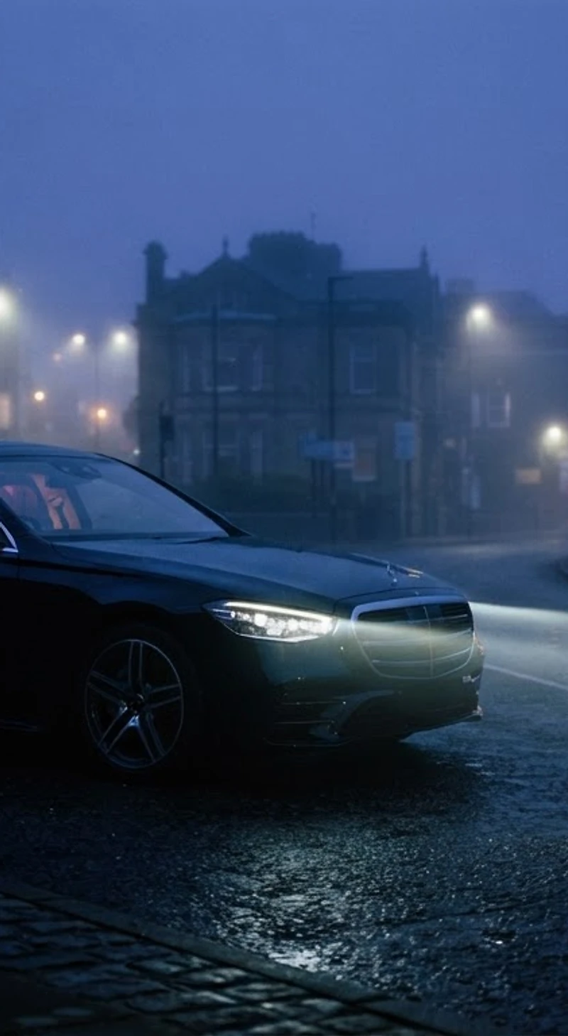 Executive Mercedes Vito minibus and E-Class estate at Blackburn blue hour