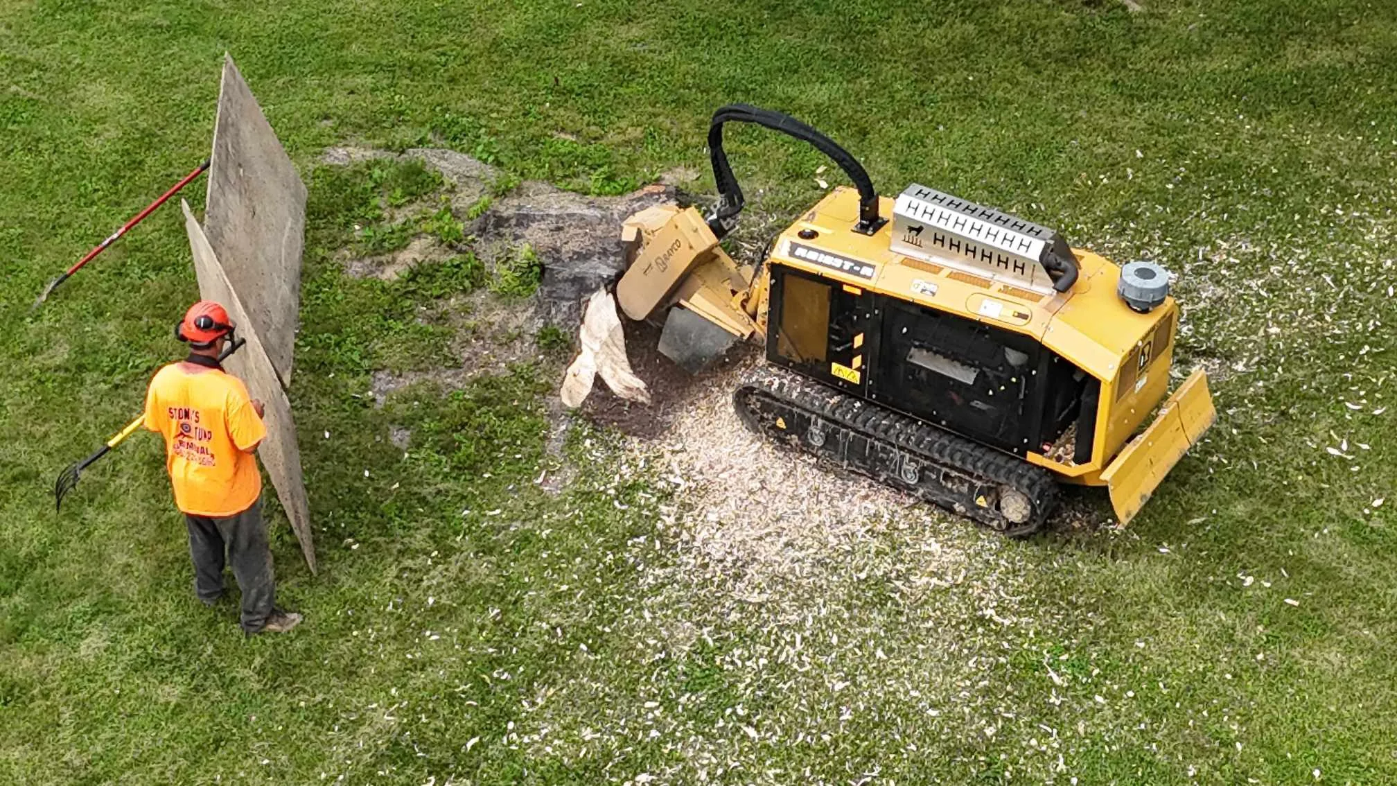 Stone's Stump Removal equipment and completed stump grinding projects in Central Indiana