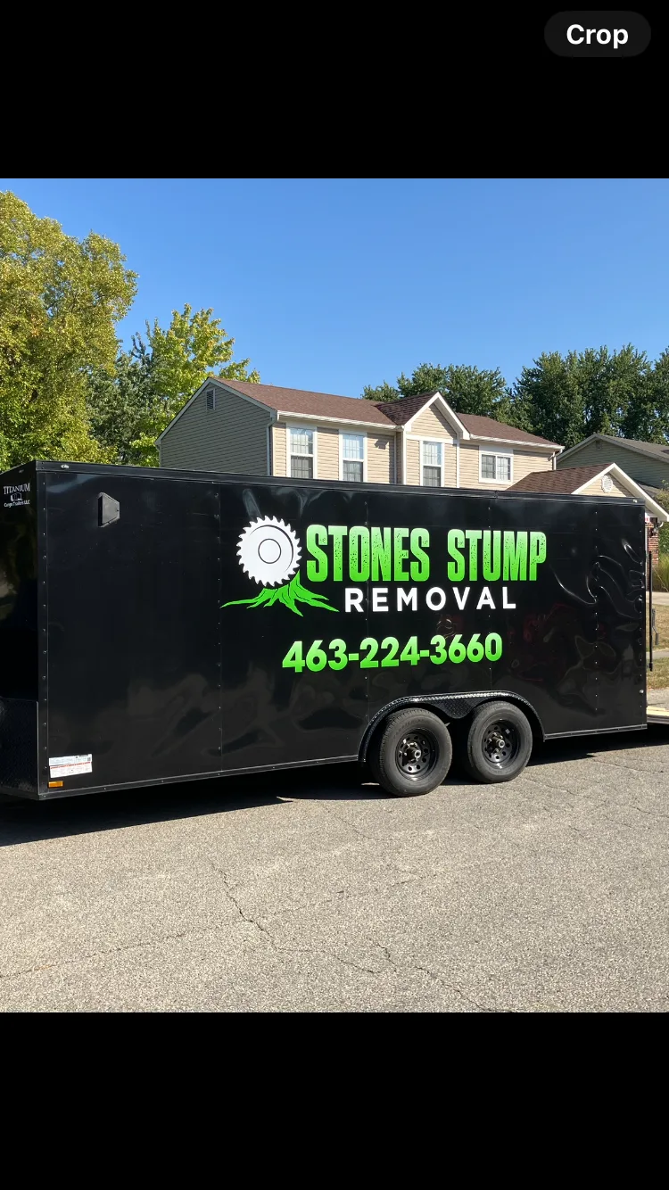 Stone's Stump Removal trailer and grinder equipment on a Central Indiana job site