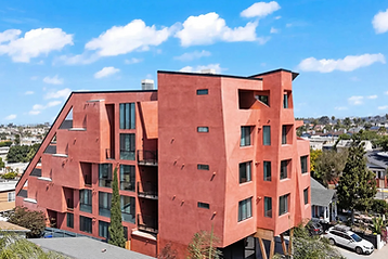 Aerial view of the terracotta-colored Nok Nok apartment building at 4384 Hamilton Street, San Diego