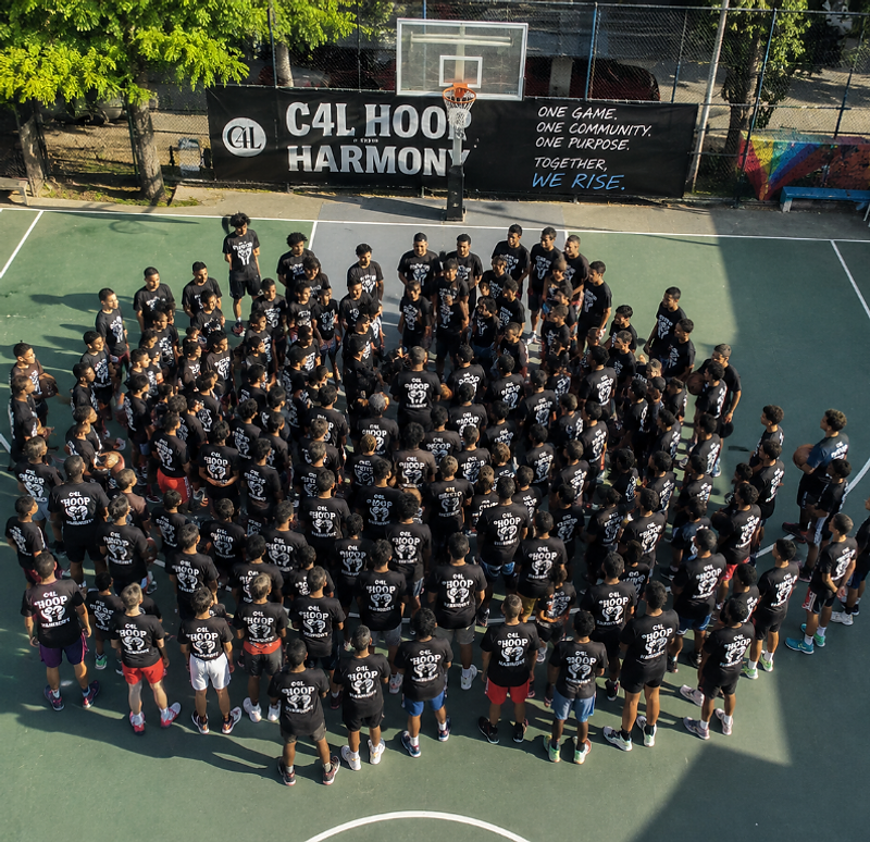 Young basketball players training together