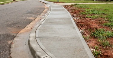 Sidewalks + Curb & Gutter