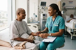 A Lagosian nurse caring for a patient at Iconic Care Hospital