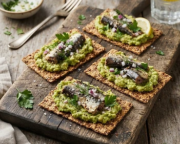 Avocado And Sardine Mash On Flax Crackers