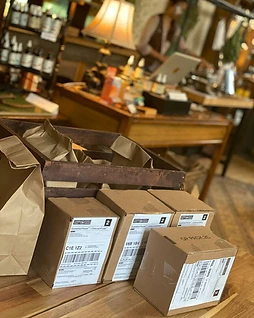 Online orders packed and labelled for shipping inside the Hollow Reed apothecary
