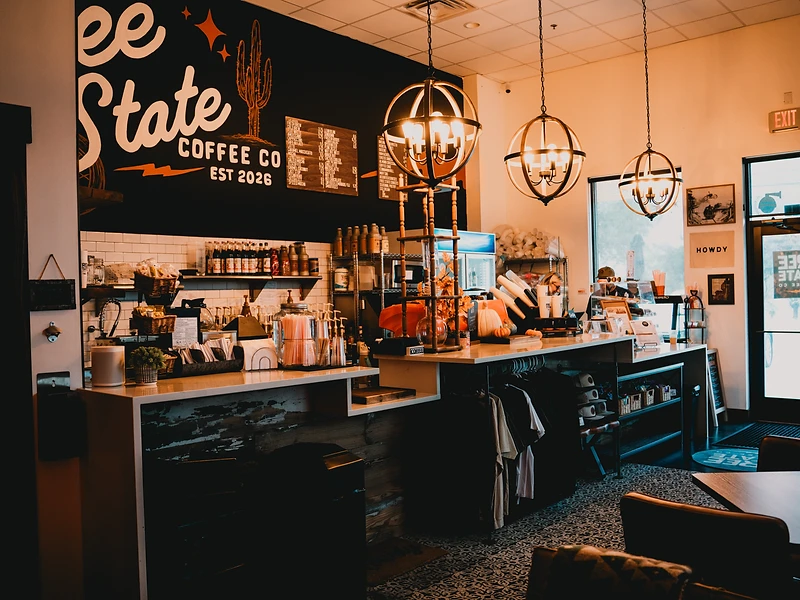 Free State Coffee Co service counter, menu board, and shop mural