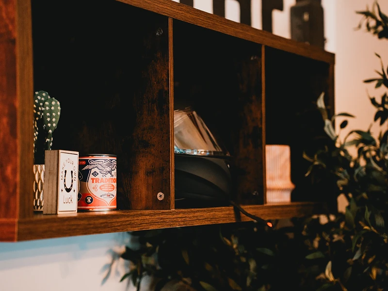 Decor and books on the shelf at Free State Coffee Co