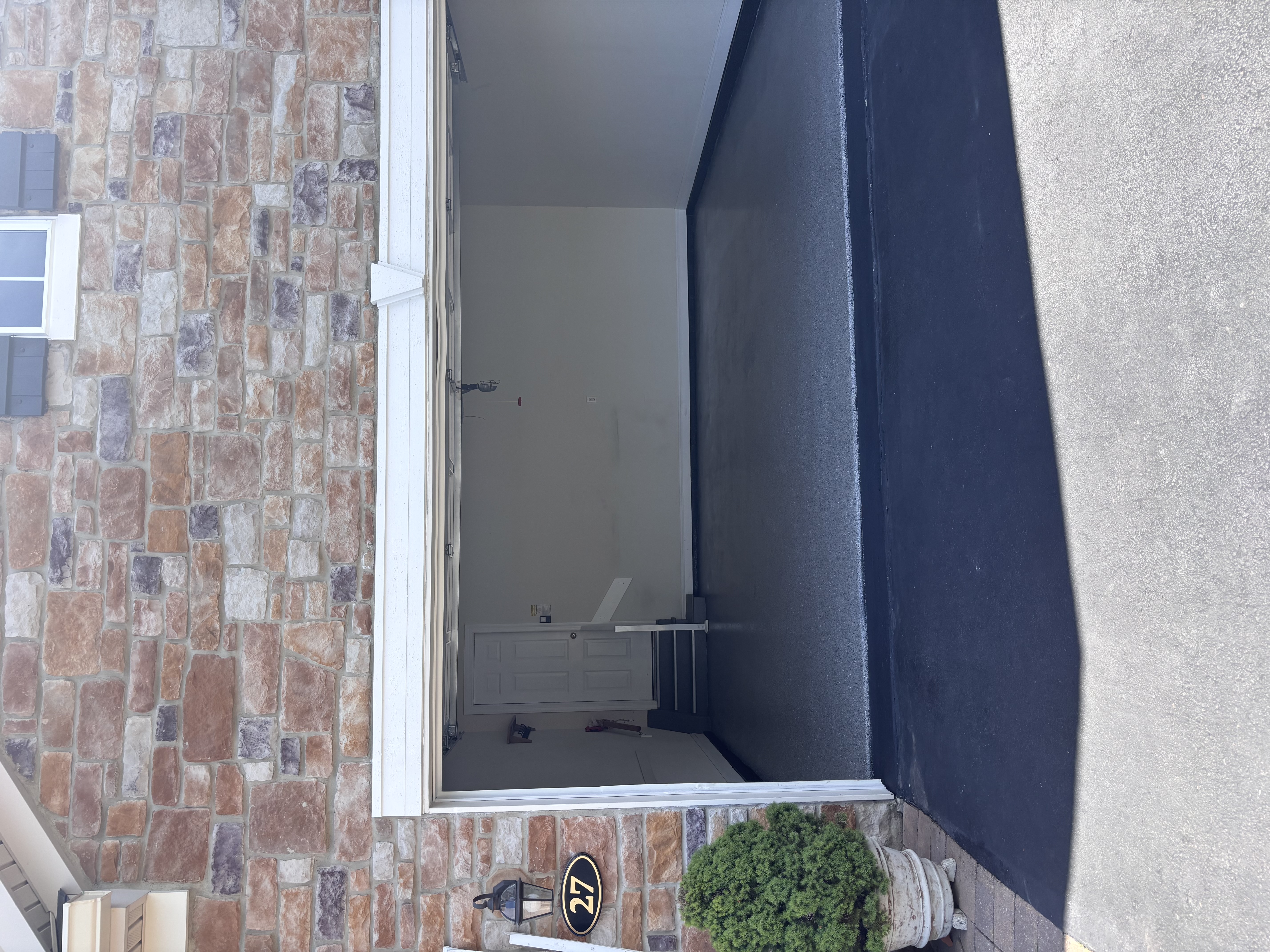 Stone-Front Garage — Dark Grey Epoxy — Epoxy Flake flooring installation in PA