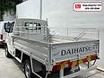 Daihatsu Gran Max steel cargo body, rear three-quarter view with a tubular steel frame around the cargo bed