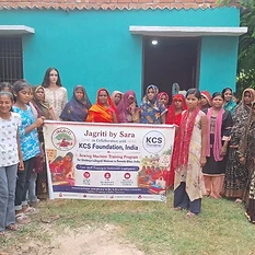 Program participants with the Jagriti by Sara banner