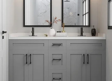 Compact gray double vanity with matte black hardware, marble countertop and framed mirrors