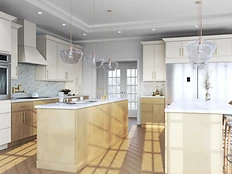 Modern kitchen with light wood flat-panel cabinetry, marble waterfall island and gold hardware