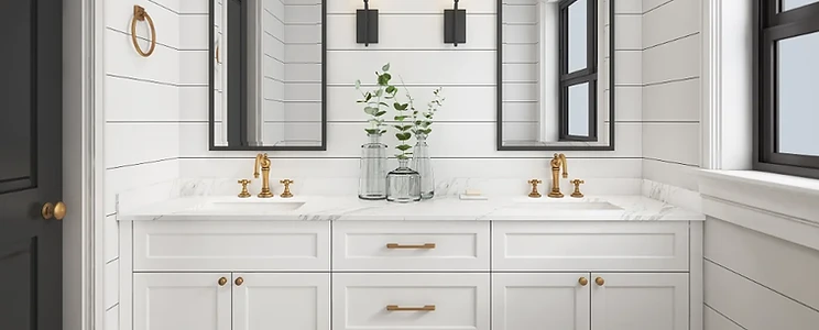 White shaker double vanity with brushed gold hardware and shiplap walls