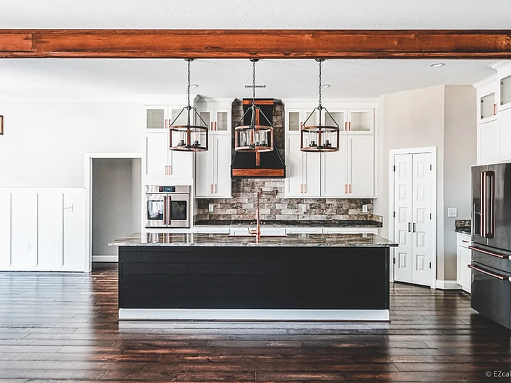 Custom wood range hood in a finished Virginia kitchen