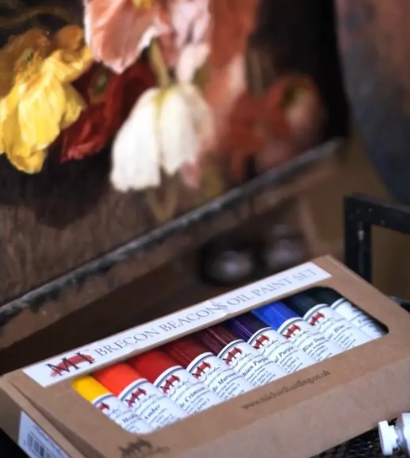 Michael Harding Brecon Beacons oil paint set held open, with tubes of colour