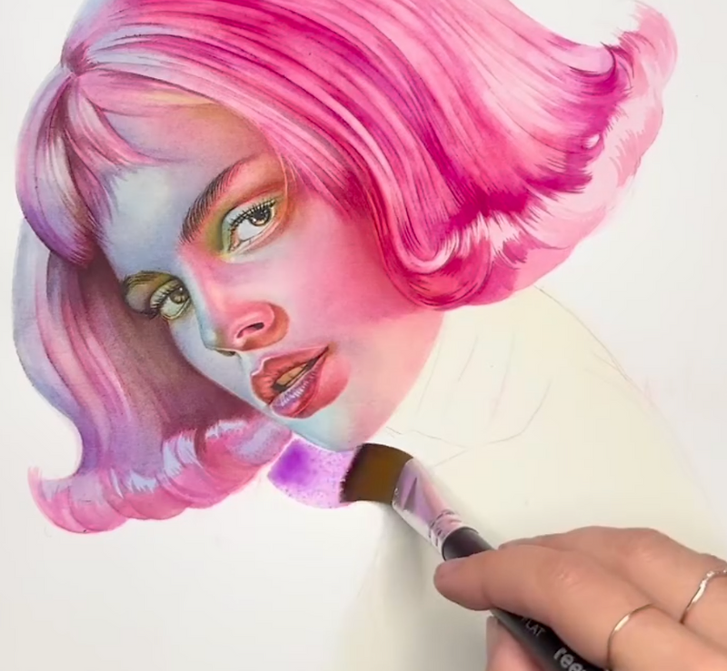 Anabell Ayala-Rodriguez painting a watercolour portrait
