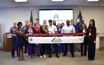 Arc Painting Solutions team at a Chamber of Commerce ribbon-cutting ceremony