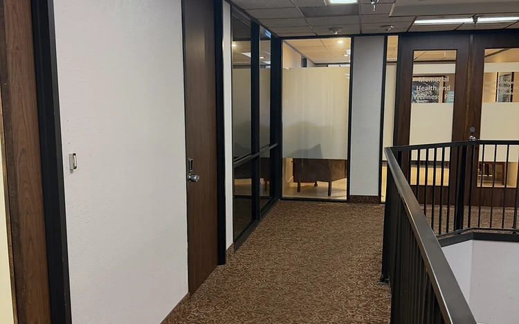 Commercial building hallway with freshly repainted walls by Arc Painting Solutions