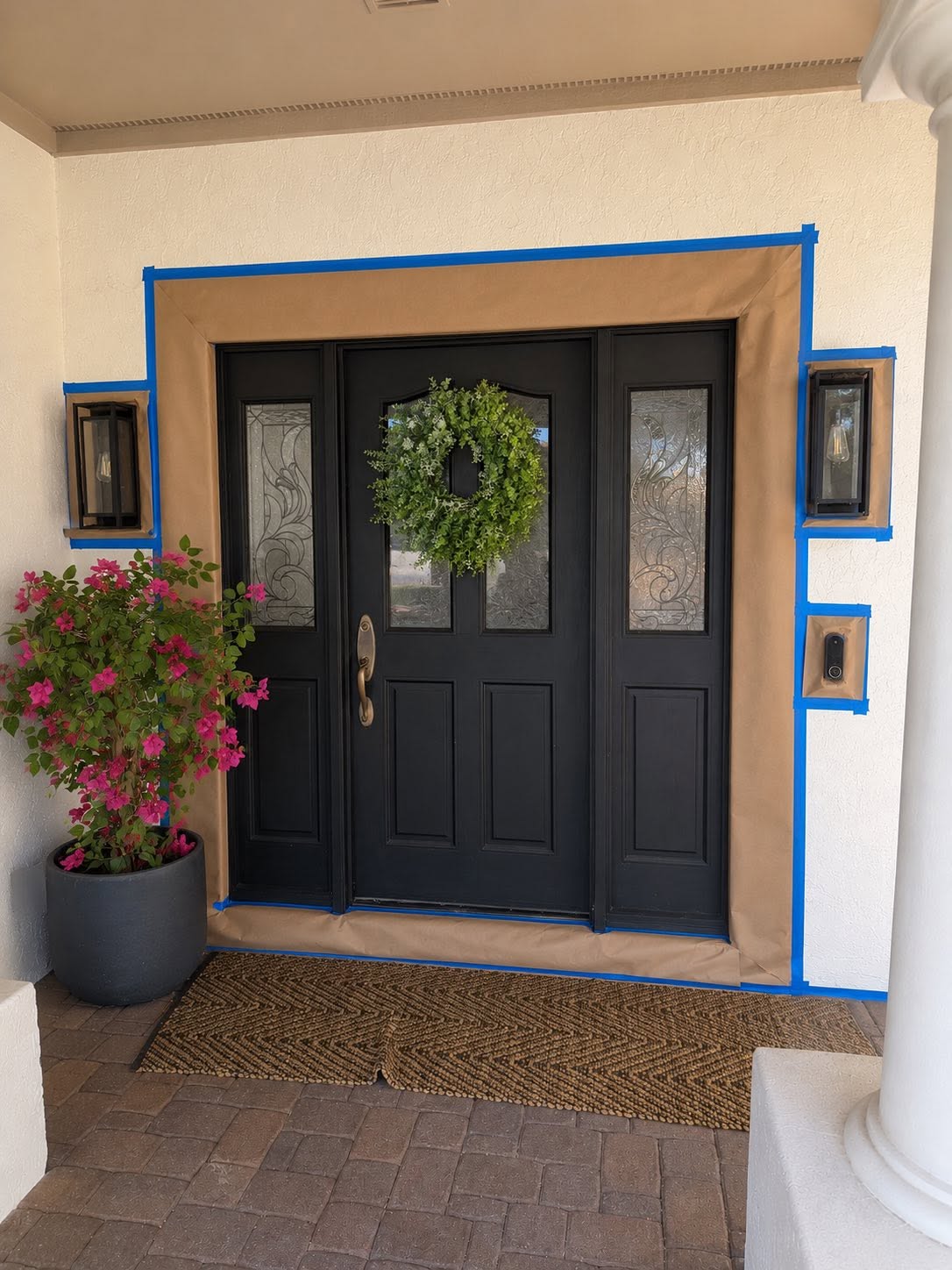 IN PROGRESS — front door masked and prepped for black paint. by Arc Painting Solutions in The Woodlands, TX