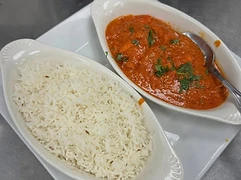 Sauced entrée served with rice