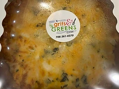 Packaged tomato pie with visible Grits & Greens Market label