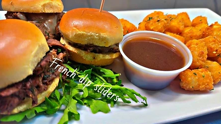 French dip sliders served with dipping jus and a crisp fried side