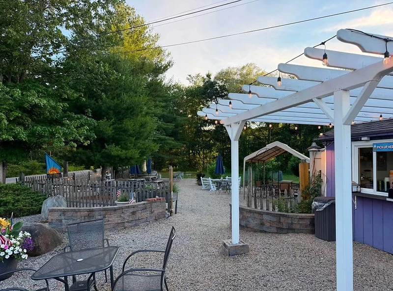 Outdoor patio and pergola at Ellington Depot Café & Market