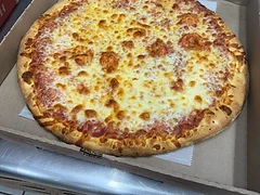 Round cheese pizza with a browned oven-finished top