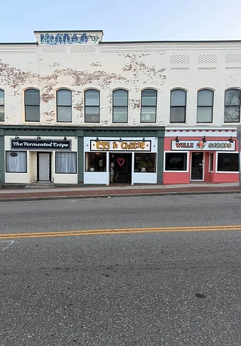 Wide Main Street view of the Egg and Cheese storefront