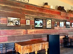 Interior wood feature wall honoring the building’s history