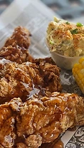 Fried chicken dinner with side dishes
