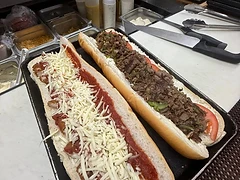 Two large grinders being prepared