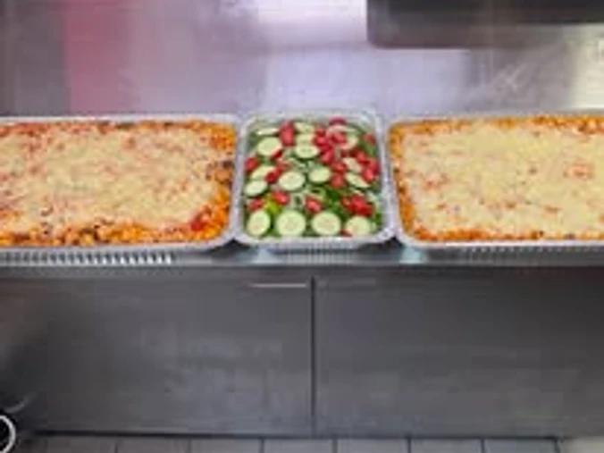 Sheet pizzas and a fresh salad at Jack's Pleasant Pizza