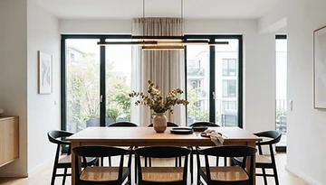 Illustrative example of a modern ceiling light fixture installed in a dining room