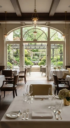 An elegant restaurant interior with beautifully set tables
