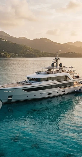 A luxury superyacht deck at golden hour