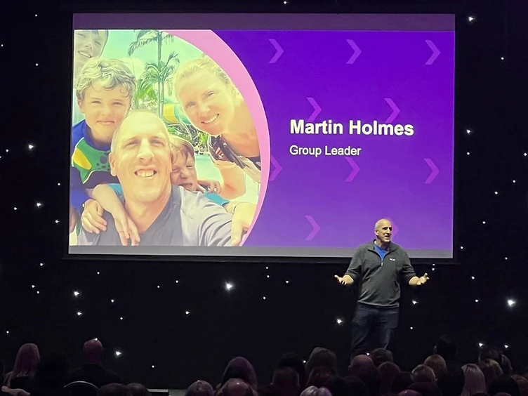 Martin speaking on stage