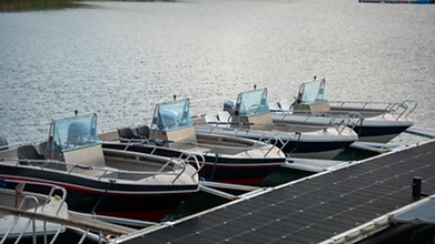 Aluminum fishing boats docked at the pier at Ersfjordbotn Brygge