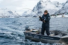 Guest preparing fishing gear on the dock